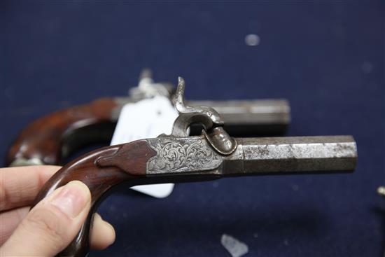 A pair of early 19th century steel boxlock pocket pistols, 6in.